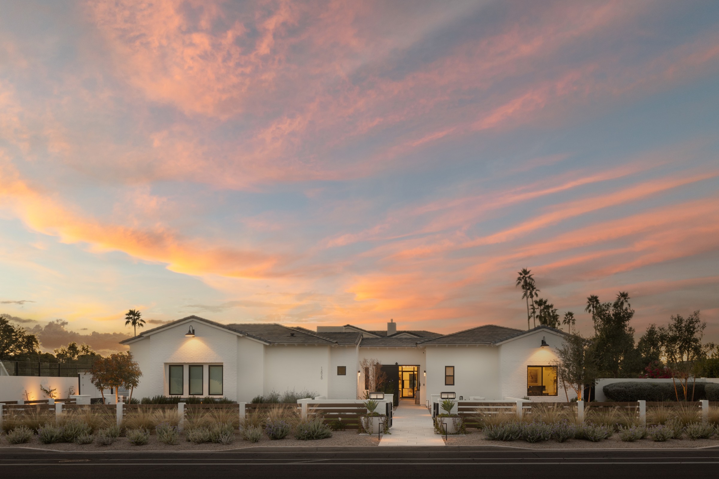 Luxury home with padel court for sale Scottsdale Arizona exterior at sunset