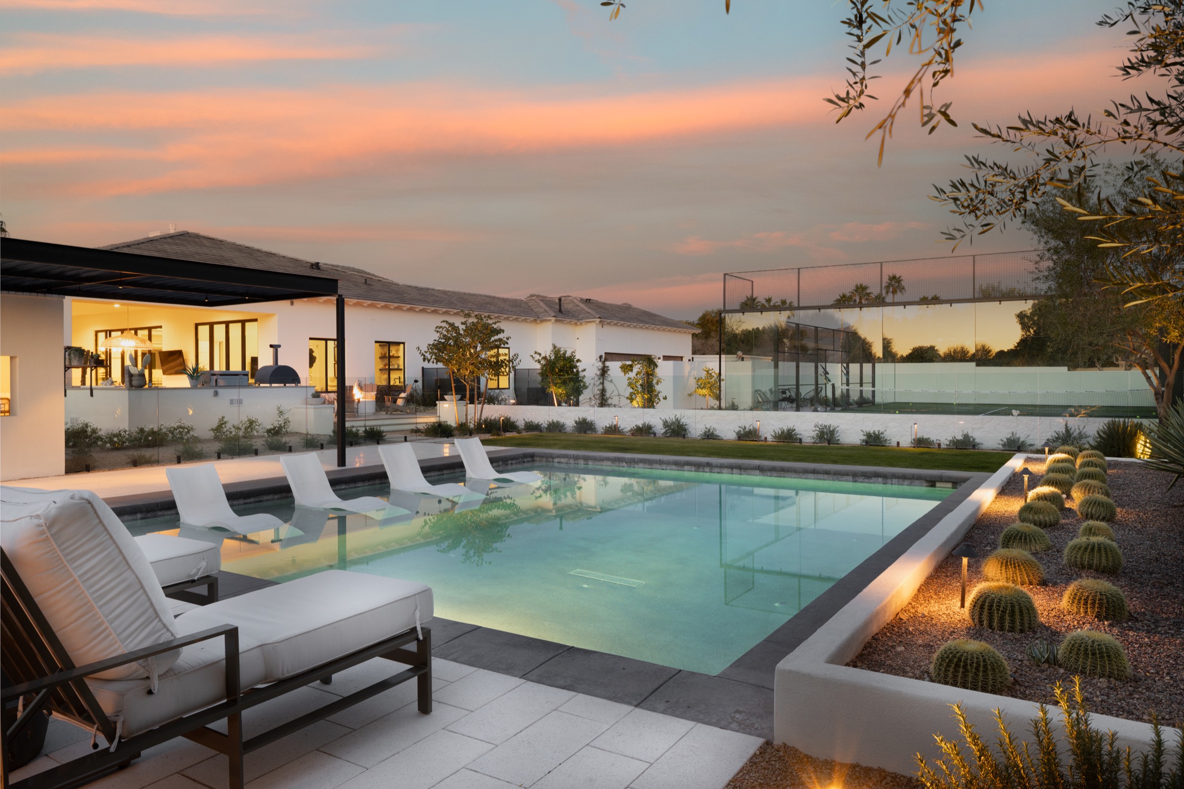 Resort pool with padel court luxury home Scottsdale AZ